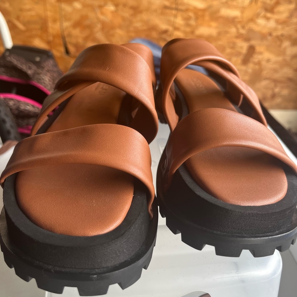 Artisan Tan and Black Sandals with Elegant Design